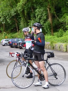 two riders at water stop