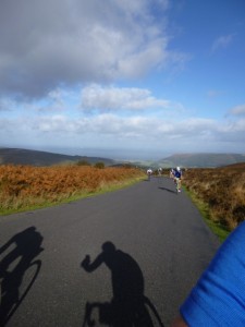 riders behind sunshine ahead