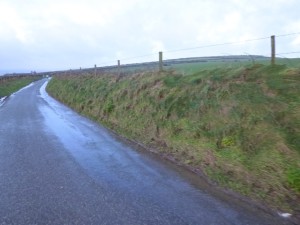 Wet roads under dry skies