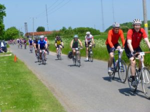 brief stop with riders passing by