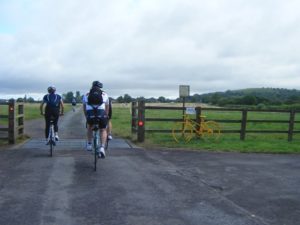 cattle grid and yellow bike